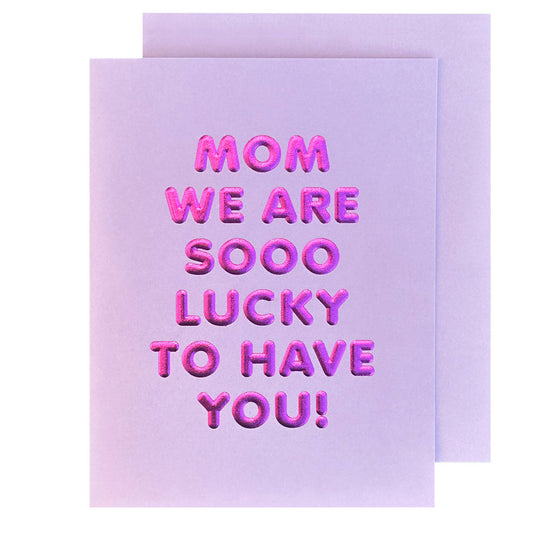 Greeting card with pink text on a light purple background