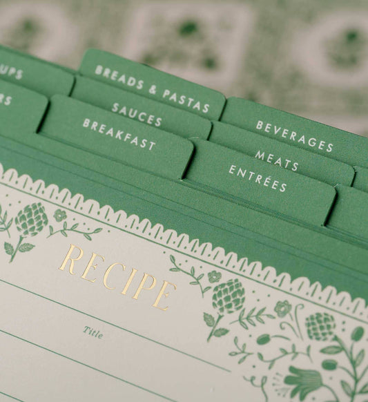 Set of recipe card dividers with green labels on a floral-patterned background