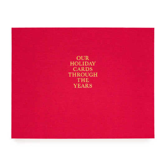 Red card with gold text 'Our Holiday Cards Through the Years' on a white background