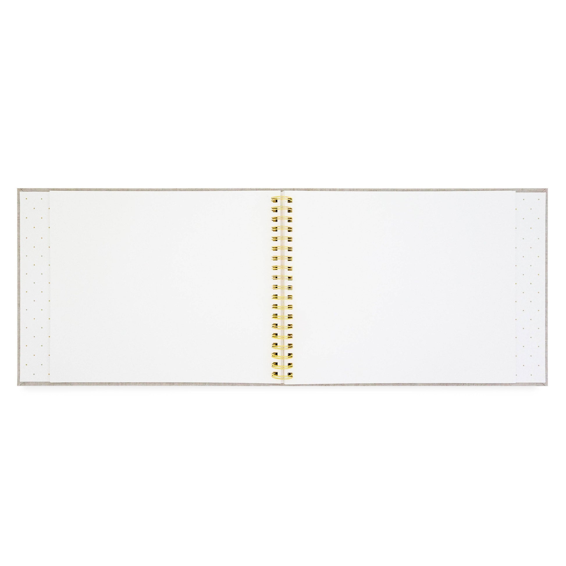 Open notebook with white pages and gold spiral binding on a white background holiday book